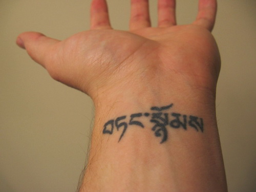 om wrist tattoos for men